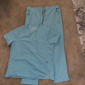 Figs scrubs in Sea Glass Casma top and Yola pants